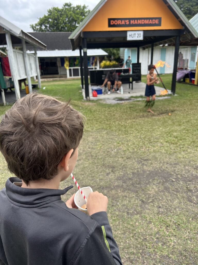 A kid CS's age twirling a stick on fire